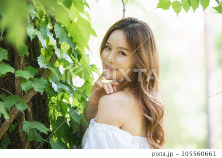 a beautiful woman in the forest a beautiful woman in the forest 105560661