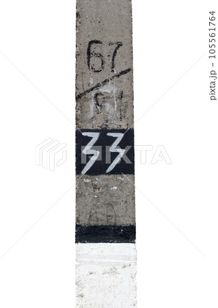 Cement column with the inscription thirty three. 105561764
