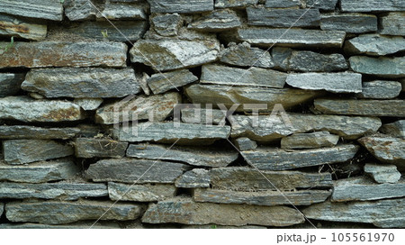Wall texture background made of piled stone debris Wall texture background made of piled stone debris 105561970