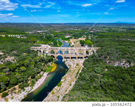 Three-tiered aqueduct Pont du Gard was built in Roman times on the river Gardon and magnificent 105562472