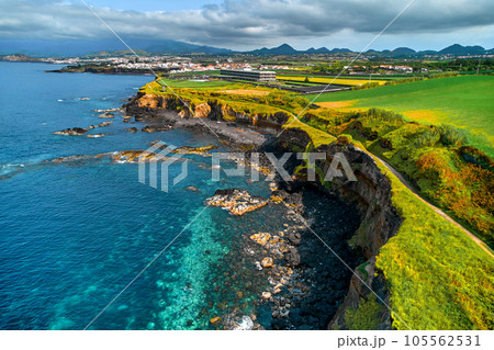 Drone point of view, picturesque nature of Azores. Drone point of view, picturesque nature of Azores. 105562531