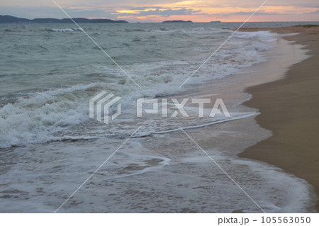 Raging Sea with Sunset Sky Background 105563050