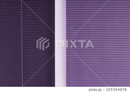 Purple corrugated paper texture. Geometric shapes and lines. Minimalist background. Flat lay. Purple corrugated paper texture. Geometric shapes and lines. Minimalist background. Flat lay. 105564876