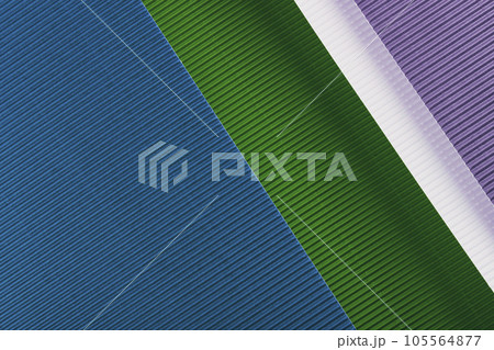 Blue, green and purple corrugated paper texture. Geometric shapes and lines. Minimalist background. Flat lay.  105564877