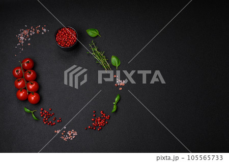 Ingredients for cooking cherry tomatoes, salt, spices and herbs Ingredients for cooking cherry tomatoes, salt, spices and herbs 105565733