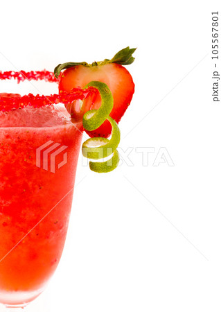 Strawberry daiquiri cocktail with strawberry and lime as a garnish. Strawberry daiquiri cocktail with strawberry and lime as a garnish. 105567801