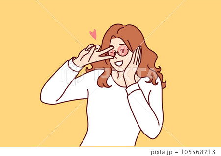 Coquettish woman puts hand to ear and winks, wanting to meet or seduce passerby she likes Coquettish woman puts hand to ear and winks, wanting to meet or seduce passerby she likes 105568713
