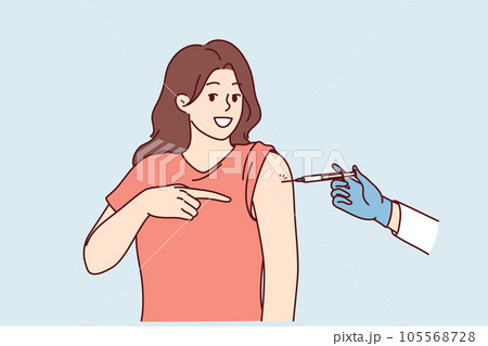 Woman gets injection in shoulder getting vaccinated and points finger at syringe in doctor hand Woman gets injection in shoulder getting vaccinated and points finger at syringe in doctor hand 105568728