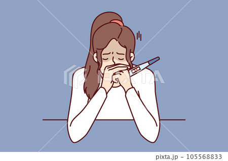 Frustrated pregnancy woman is crying holding pregnancy test with two strips and sitting at table Frustrated pregnancy woman is crying holding pregnancy test with two strips and sitting at table 105568833