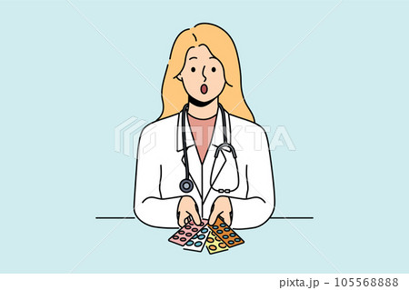 Surprised woman doctor with pills in blisters feels distrustful of drugs that can harm patient 105568888