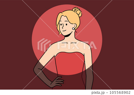 Spotlighted female movie star smiles standing in dress while attending prestigious awards show Spotlighted female movie star smiles standing in dress while attending prestigious awards show 105568902