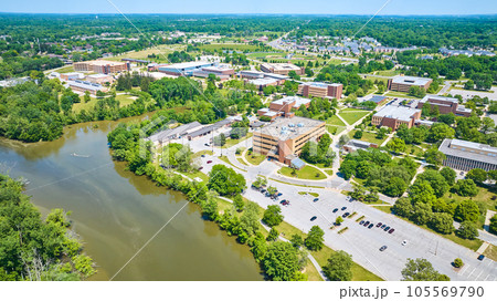 Aerial PFW college campus St Joseph River view of buildings with distant dorm rooms in summer 105569790