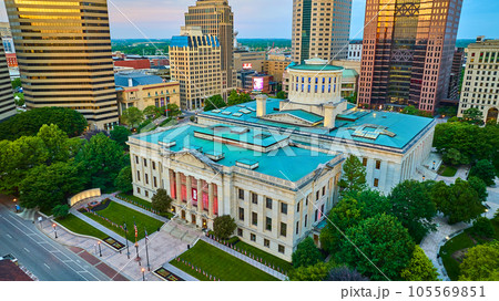 Aerial over Capital Square Foundation Columbus Ohio with golden sunlight hitting skyscrapers 105569851