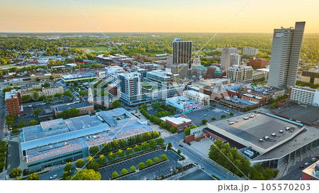 Orange glow summer sunrise over Downtown Fort Wayne business architecture cityscape skyline Orange glow summer sunrise over Downtown Fort Wayne business architecture cityscape skyline 105570203