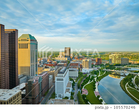 Aerial downtown Columbus Ohio with city street and winding river at sunrise 105570246