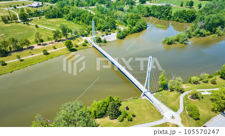 Aerial Ron Venderly Family Bridge pedestrian walking bridge over St. Joseph River to soccer fields 105570247