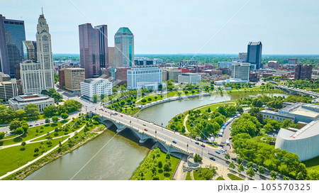 Bridge from Center of Science and Industry to skyscrapers in downtown Columbus Ohio aerial 105570325