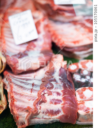 Fresh raw pork ribs offered for sale in showcase Fresh raw pork ribs offered for sale in showcase 105570861