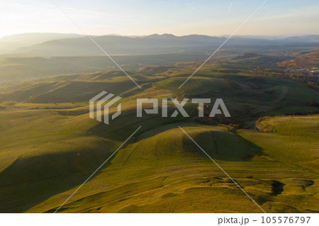 Aerial view of autumn countryside hillls, Transylvania, Romania Aerial view of autumn countryside hillls, Transylvania, Romania 105576797