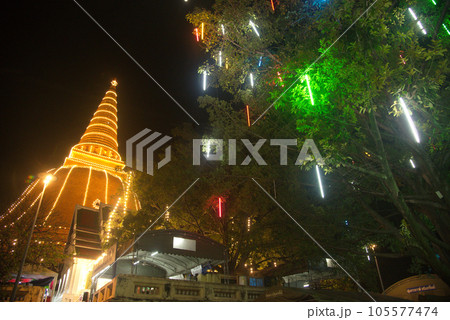 Colorful night lights at Wat Phra Pathom Chedi temple. The largest pagoda in the world on Loi Krathong Day. Which is an annual event held on a regular. Located at Nakhon Pathom Province in Thailand. Colorful night lights at Wat Phra Pathom Chedi temple. The largest pagoda in the world on Loi Krathong Day. Which is an annual event held on a regular. Located at Nakhon Pathom Province in Thailand. 105577474