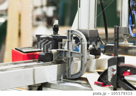 Panel saw close up. This is a type of sawing machine Panel saw close up. This is a type of sawing machine 105579315