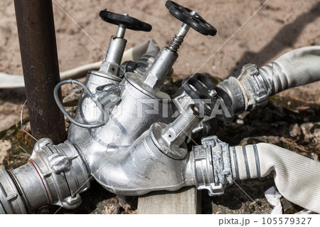 Fire pipe splitter with taps, close up 105579327