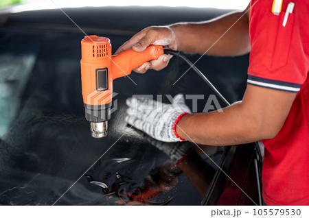 Car front windscreen film removal and tinting installation Car front windscreen film removal and tinting installation 105579530