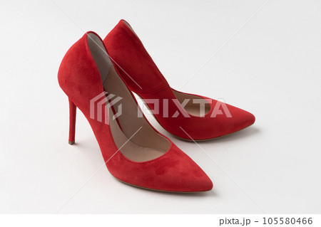 Elegant women's leather stilettos. A new pair of shoes on a white background. 105580466