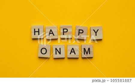 August 20-31, Happy Onam Festival, minimalistic banner with the inscription in wooden letters 105581887