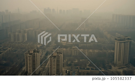 Top view of a dusty or smog-filled modern city with high-rise buildings 105582337