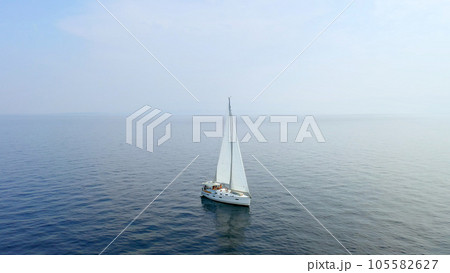 Sailing yacht in the sea. Beautiful aerial drone shot. Sailing yacht in the sea. Beautiful aerial drone shot. 105582627