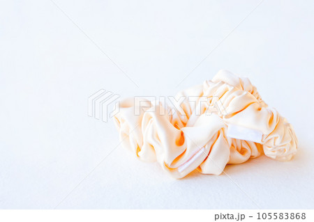 silk Scrunchy isolated on white background. Hairdressing tool of Colorful Elastic Hair Band, Bobble Scrunchie Hairband. square image 105583868