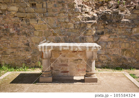 Ancient altar table 15 th century is only surving piece of chapels furnishings, which was located in the courtyard of a medieval castle in Cesis, Latvia. Ancient altar table 15 th century is only surving piece of chapels furnishings, which was located in the courtyard of a medieval castle in Cesis, Latvia. 105584324