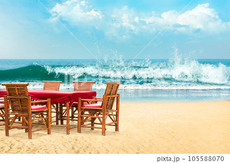 umbrella and chair on the beach and sea umbrella and chair on the beach and sea 105588070