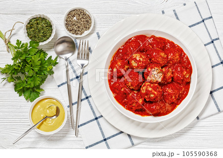 Iowa Ham Balls with tomato sauce in bowl Iowa Ham Balls with tomato sauce in bowl 105590368
