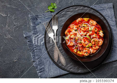 mexican shrimp cocktail salad in a bowl, top view mexican shrimp cocktail salad in a bowl, top view 105590374