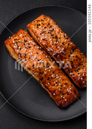 Delicious fresh grilled red fish with salt, spices and herbs Delicious fresh grilled red fish with salt, spices and herbs 105591148
