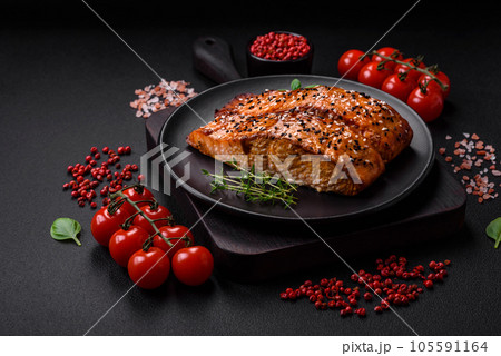 Delicious fresh grilled red fish with salt, spices and herbs Delicious fresh grilled red fish with salt, spices and herbs 105591164