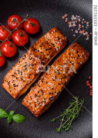 Delicious fresh grilled red fish with salt, spices and herbs Delicious fresh grilled red fish with salt, spices and herbs 105591192