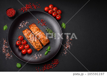 Delicious fresh grilled red fish with salt, spices and herbs Delicious fresh grilled red fish with salt, spices and herbs 105591197