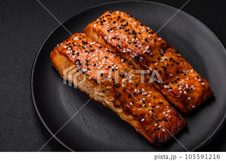 Delicious fresh grilled red fish with salt, spices and herbs Delicious fresh grilled red fish with salt, spices and herbs 105591216