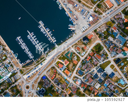 port and harbor with yachts and ships of Polish village Jastarnia, aerial view 105592927