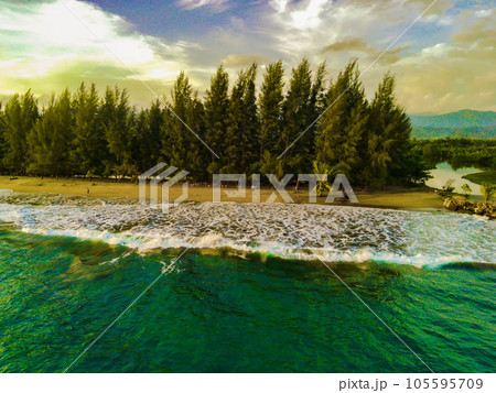 the beautiful Bali Beach in Blangpidie, South West Aceh, Indonesia with blue ocean against the blue sky shot with aerial drone. 105595709