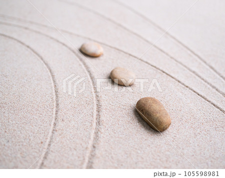 Calm Nature  Japan Concept,Zen Garden Japanese Pattern on Beach Background,Design Buddhism Texture Wave on Desert ,Top View Line Abstract on Sand with Stone,Purity Meditation Balance or Aroma Spa. 105598981