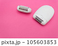 Minimalistic beauty concept. Epilation. White electric epilator hair. Copy space 105603853