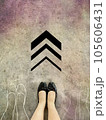 Woman standing on the concrete street  105606431