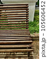 wooden bench in park 105606452