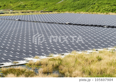 View of the floating Solar power system on the flood detention basin in Kaohsiung, Taiwan. View of the floating Solar power system on the flood detention basin in Kaohsiung, Taiwan. 105607984