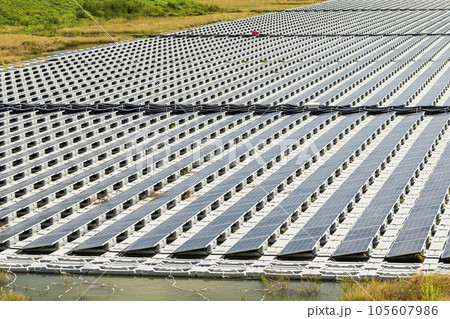 View of the floating Solar power system on the flood detention basin in Kaohsiung, Taiwan. View of the floating Solar power system on the flood detention basin in Kaohsiung, Taiwan. 105607986