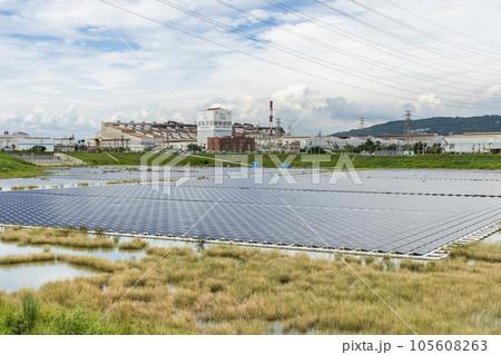 View of the floating Solar power system on the flood detention basin in Kaohsiung, Taiwan. View of the floating Solar power system on the flood detention basin in Kaohsiung, Taiwan. 105608263